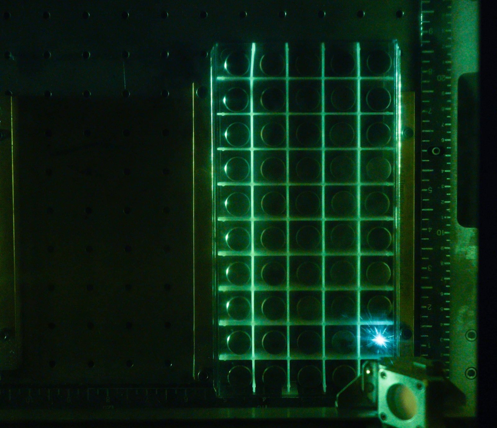 A box of Drillexa’s efficient Omega cutters in green light